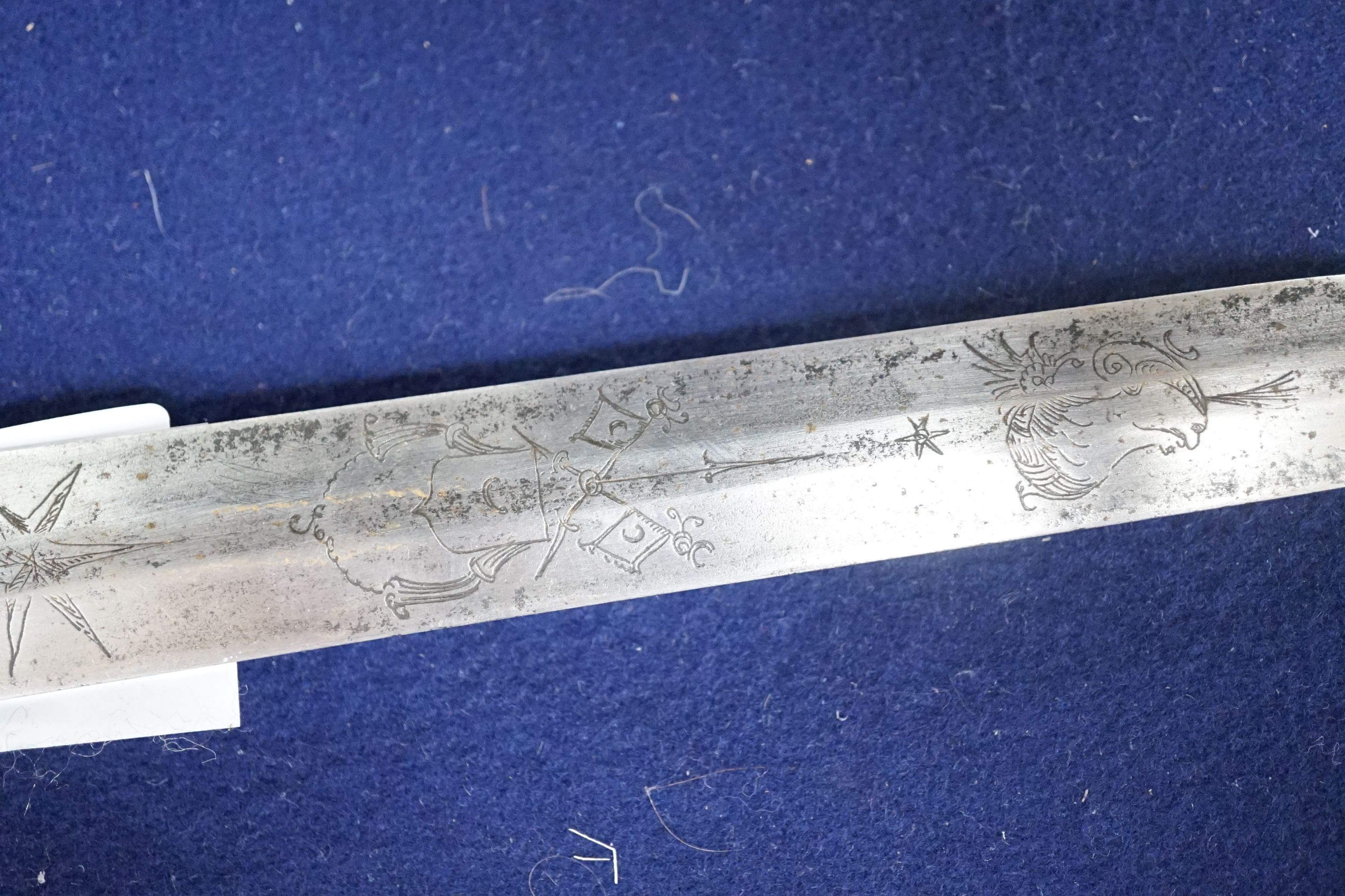 An 18th century German hunting hangar, etched blade. Total length 56.5cm